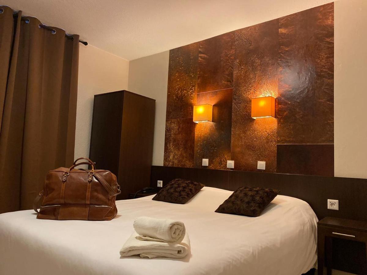Logis Hostellerie De L'Abbaye เลอ โตโรเนต์ ภายนอก รูปภาพ